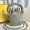 Fendi Mini Mon Tresor Bucket Bag with Woven Handle In FF Motif Canvas Olive